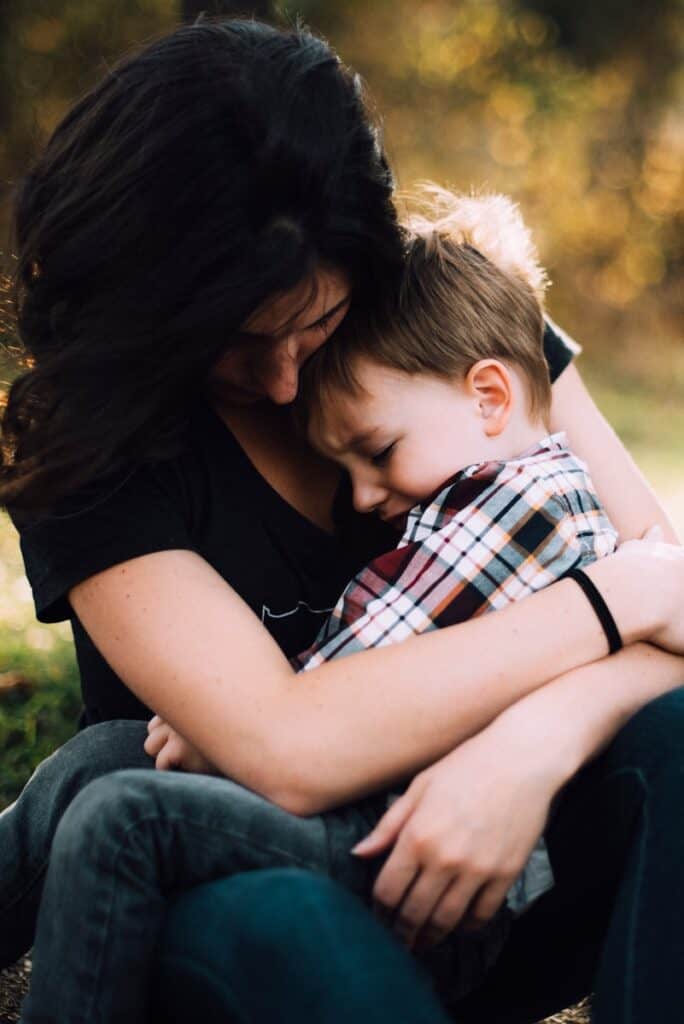 Mother embracing her son, symbolizing family support during probate and estate planning in Texas